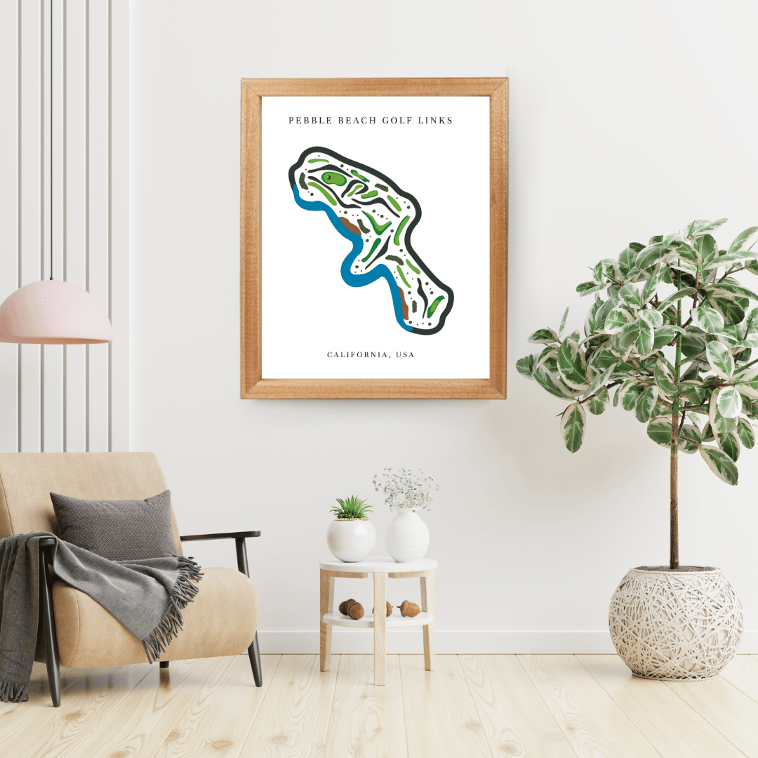 Framed map of Pebble Beach Golf Links in a living room setting with decor elements.