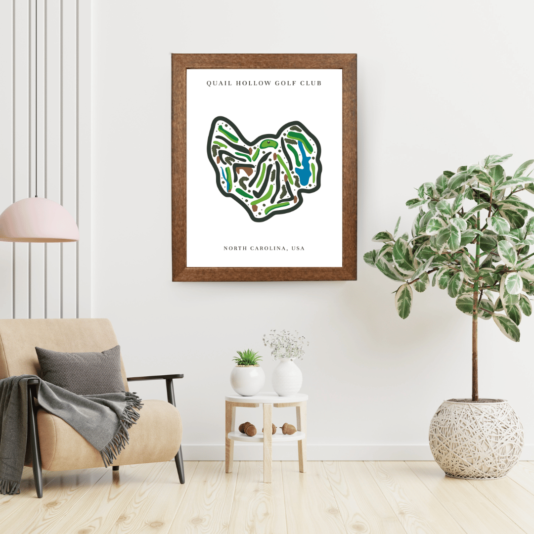 Framed map of Quail Hollow Golf Club in North Carolina on a wall in a living room.
