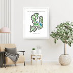 Framed golf course map on a wall in a living room with decor elements.